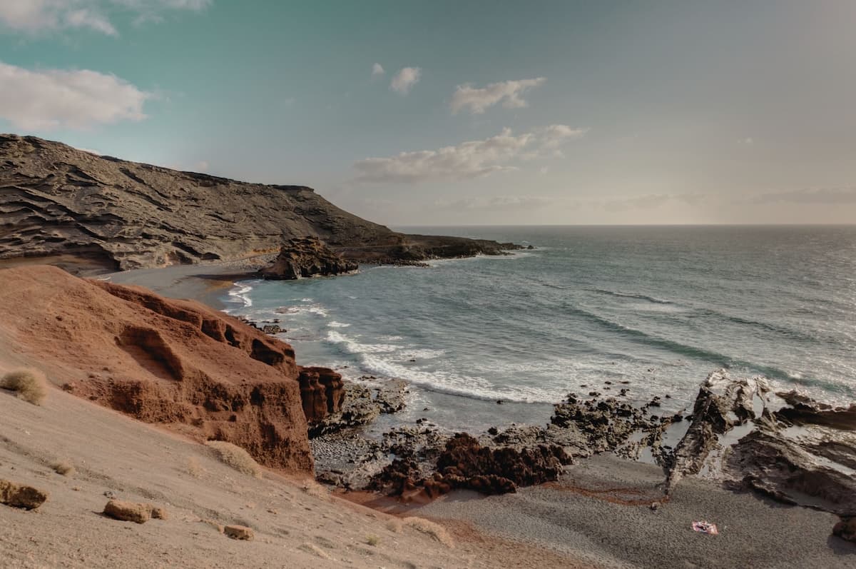 Yoga practice among volcanic landscapes of Lanzarote