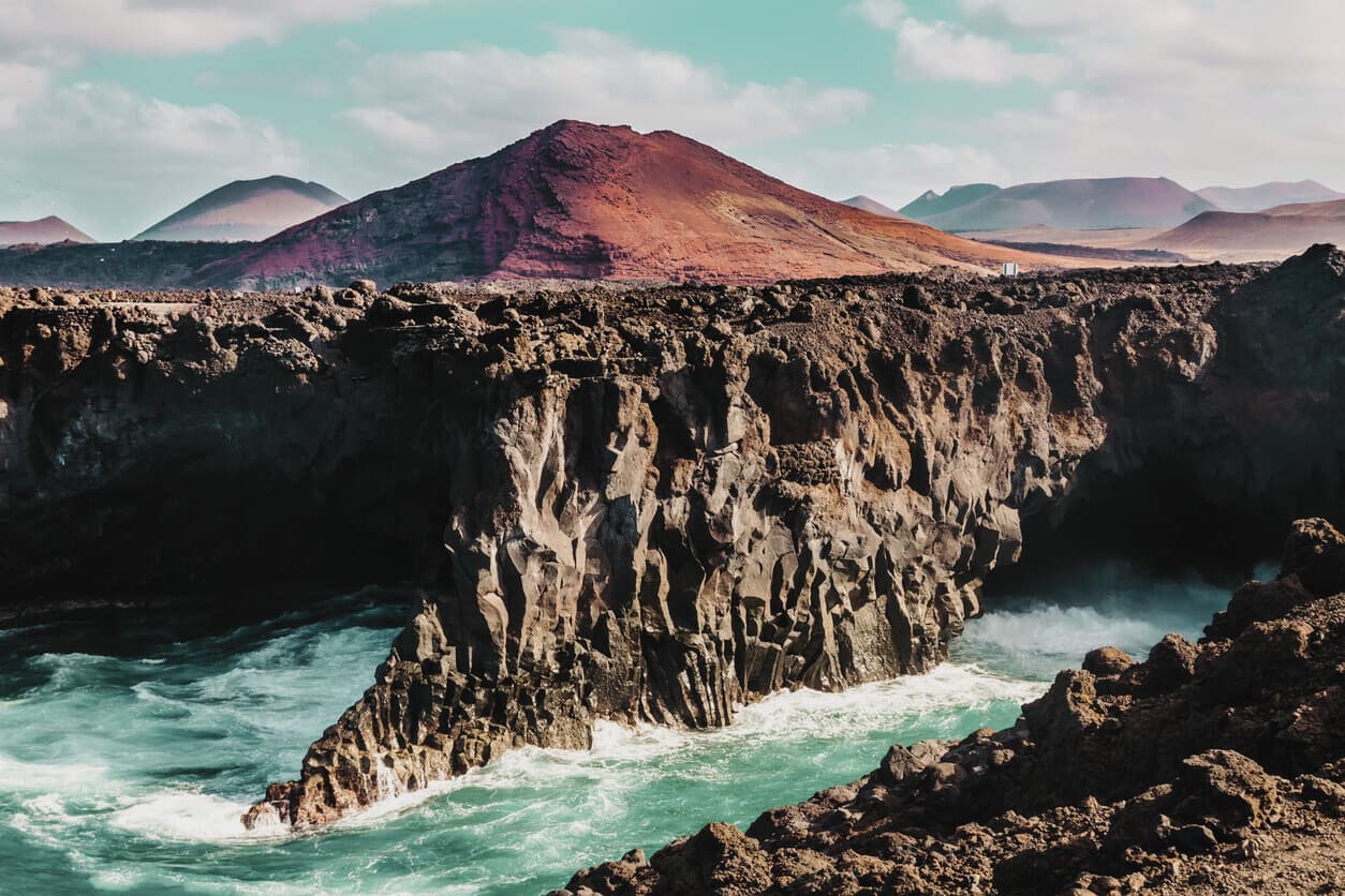 Retreat group on a black sand beach in Lanzarote