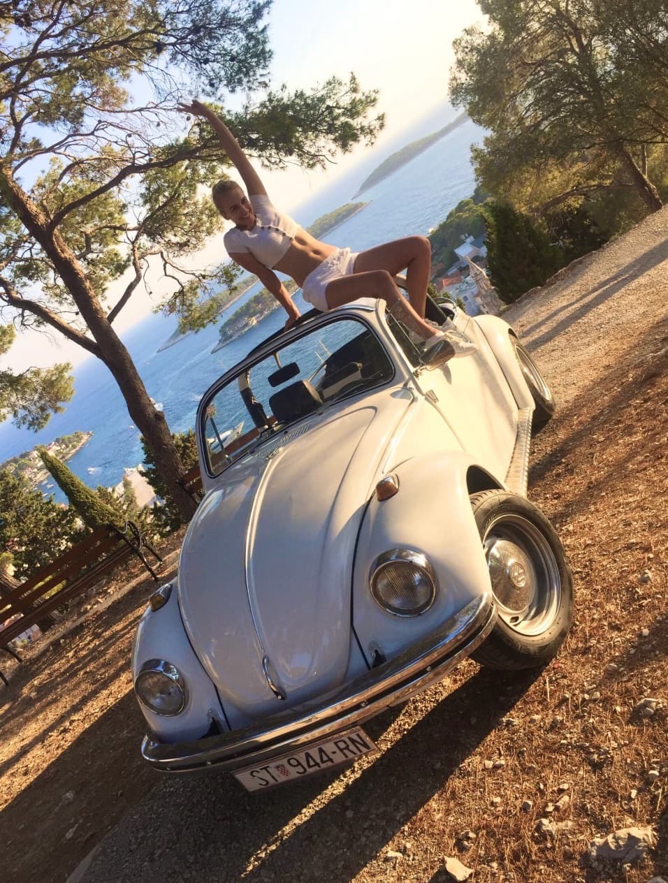 Charming old town harbor of Hvar with yachts and stone buildings