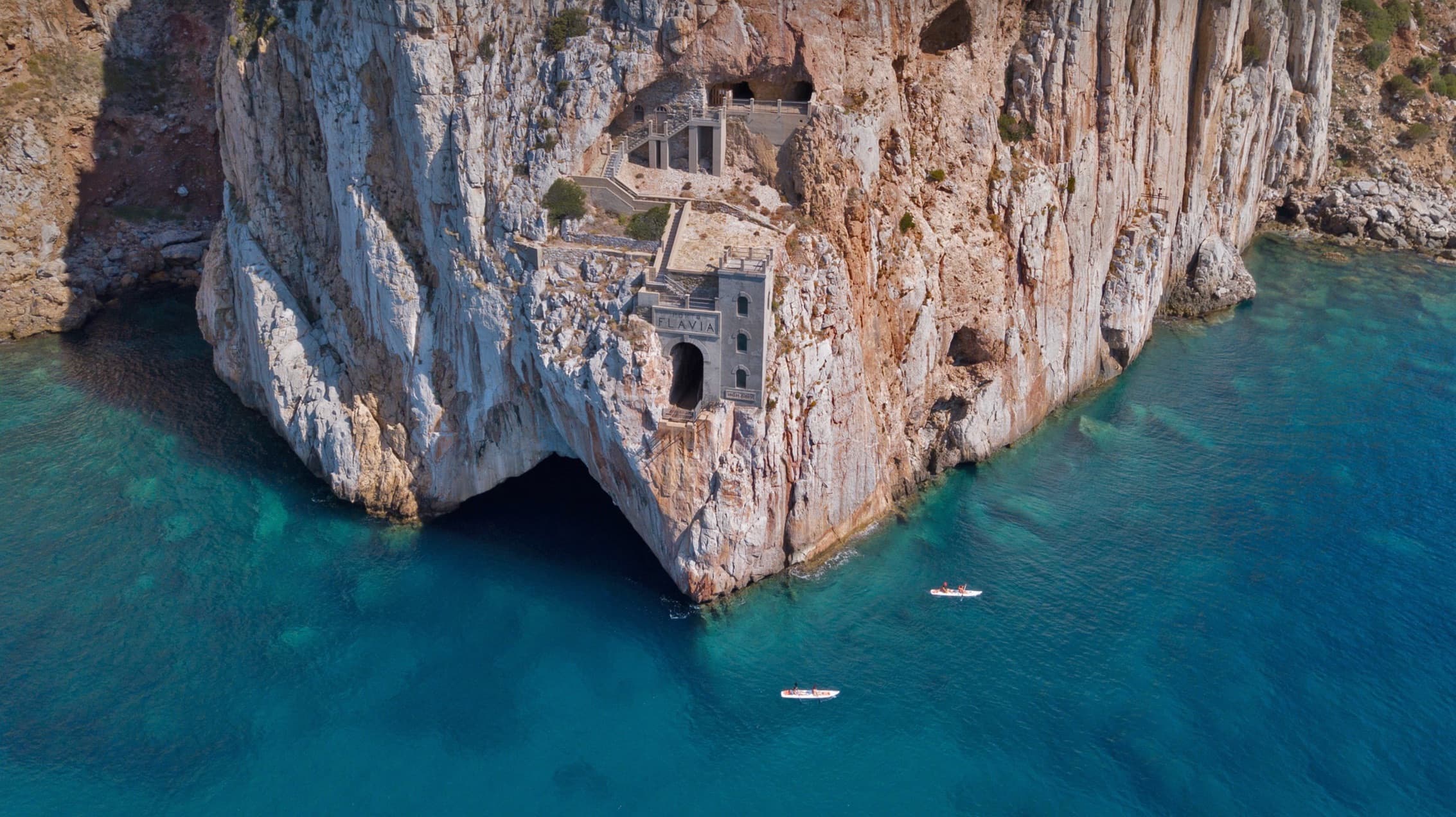 Dramatic limestone cliffs of Bonifacio, Corsica rising above the turquoise sea